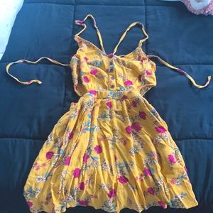 Romper with side cutouts.